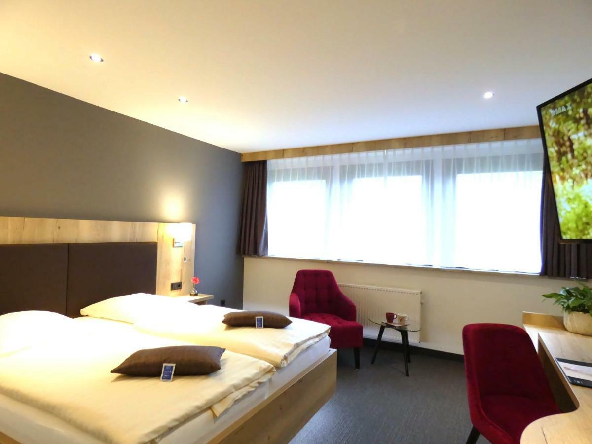 Akzent Hotel Cordes & Restaurant Am Rosengarten Sottorf Bagian luar foto