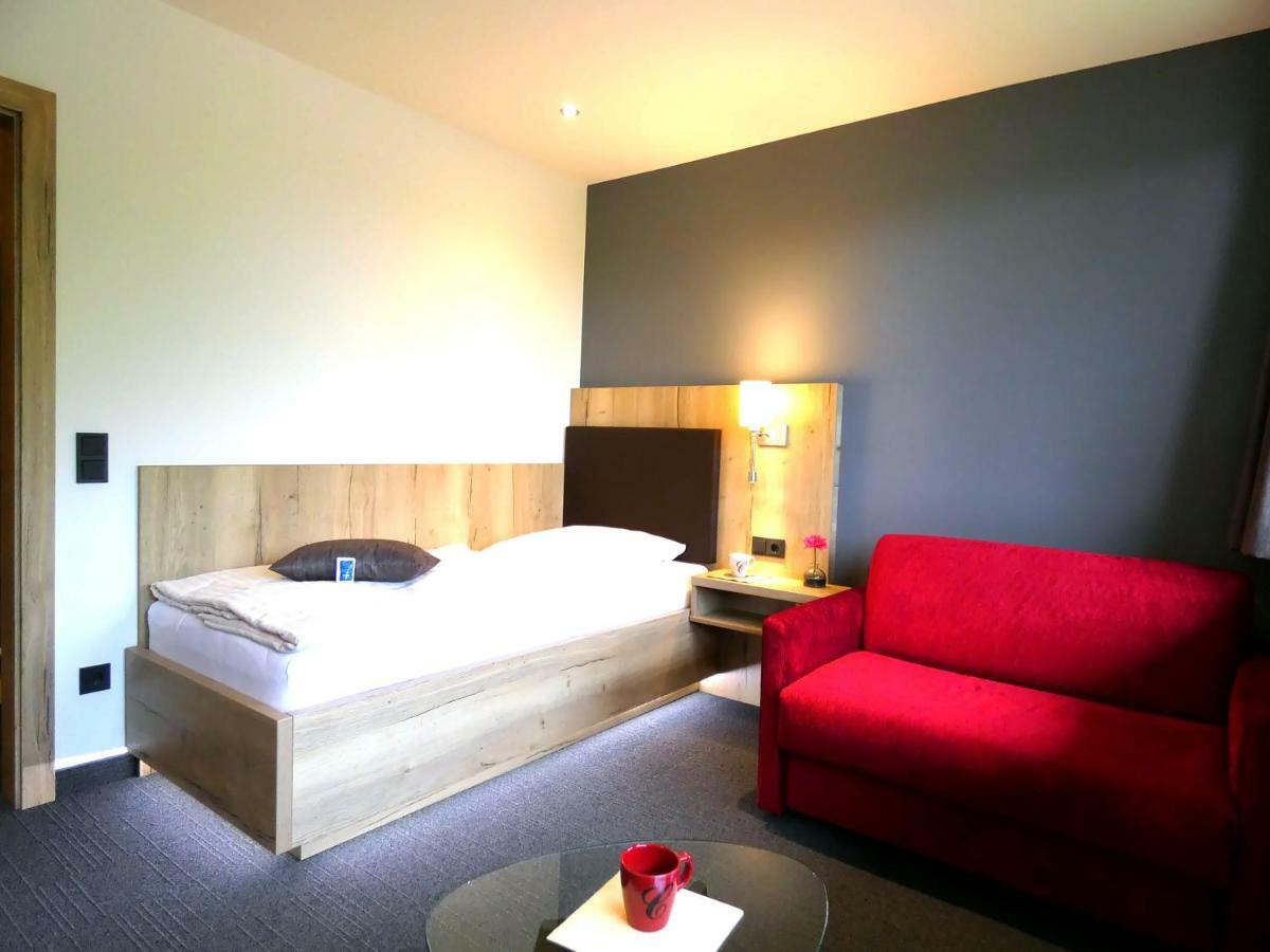 Akzent Hotel Cordes & Restaurant Am Rosengarten Sottorf Bagian luar foto